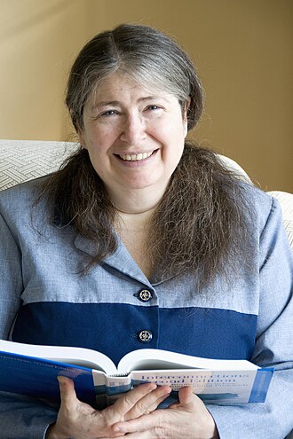 Radia Perlman presenting on stage